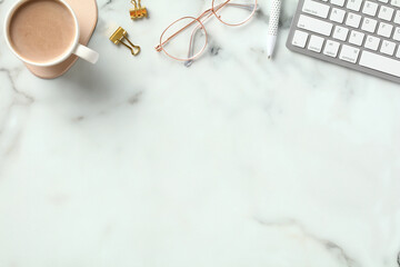 Fototapete - White marble office desk table with keyboard, coffee cup, female glasses, office supplies. Flat lay, top view.