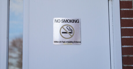 No smoking sign on wall showing to quit smoking and better for environment