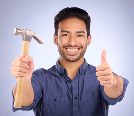 Aufkleber - Man, studio and portrait with thumbs up and hammer for handyman, maintenance or repair work with smile. Happy asian model person on purple background for engineer, mechanic or technician job tools
