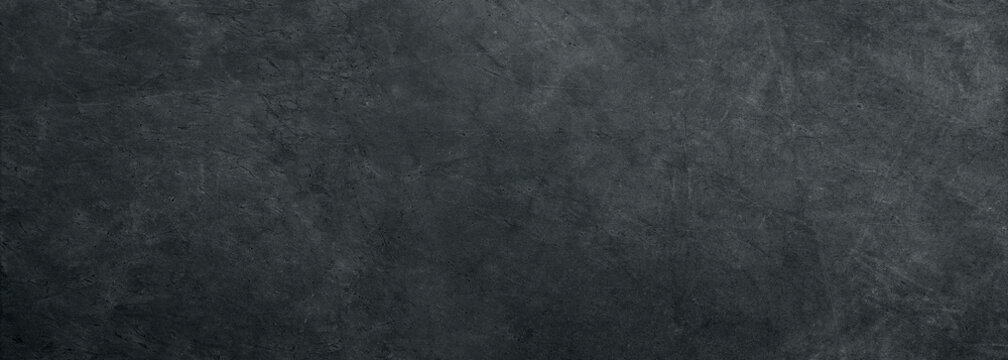 black white concrete wall , grunge stone texture , dark gray rock surface background panoramic wide 
