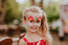 Cute Blond Girl With Face Painting