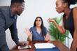© Meeko Media - A mediator tries to keep the peace during argument, office boardroom. Divorce, arbitration