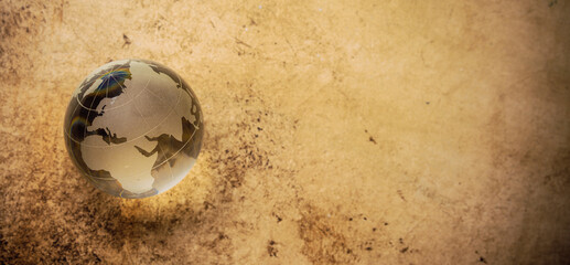 world globe crystal glass on black background