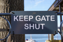 Keep Gate Shut Sign. Public Notice Sign To Boatyard