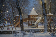 In The Winter Park, A Children's Playground Covered With Snow.