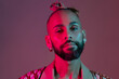 © Andrii - Black man in neon studio light
