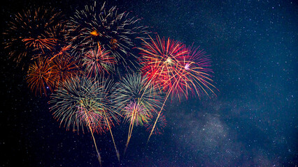 Wall Mural - fireworks with blur milky way background
