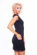 © bartekwardziak - figure of a beauty young blonde woman posing in black short elegance dress