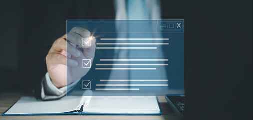 Poster - Business concept and smart checklist on virtual screen. Businessman smart checklist and signs electronic on digital documents concept, Businessman use a pen signs on virtual screen documents..