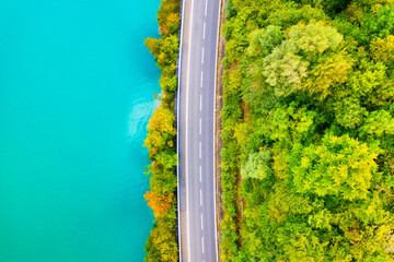 Wall Mural - the road near turquoise lake. aerial landscape. the road by the lake in switzerland. summer landscap