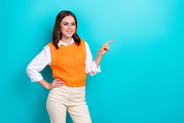 Sticker - Portrait of positive adorable girl with straight hairdo wear white shirt directing empty space isolated on turquoise color background