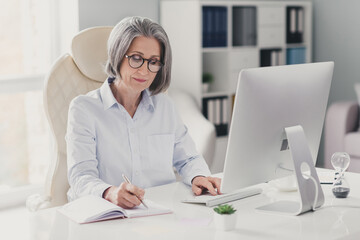 Sticker - Photo of clever experienced attorney lady sitting leather chair use pc hold pen write notepad modern office inside