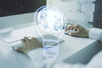 Aufkleber - Creative light bulb illustration with human brain and with hands typing on computer keyboard on background, future technology concept. Multiexposure