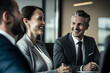 © Insanian Bous - Smiling business people in meeting