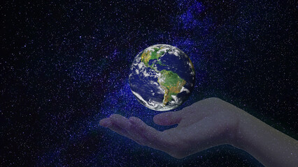 hand holding earth