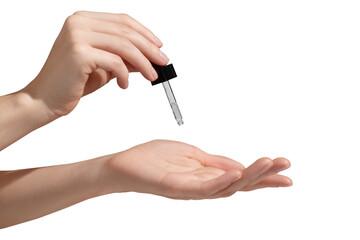 woman hand holding facial essential oil or serum packaging on transparent background. beauty cosmeti