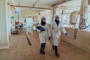  Arab business partner visiting a cheese factory. The concept of investing in small businesses