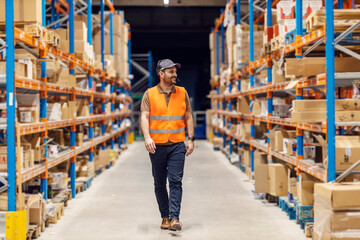 Wall Mural - A post office worker is walking trough storage and searching for package.