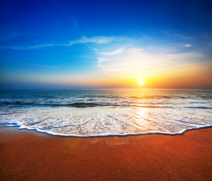 Fototapete - beautiful sandy beach and sea a sunset time