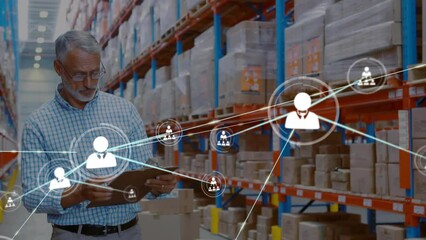 Poster - animation of network of profile icons over caucasian male supervisor checking stock at warehouse