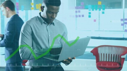 Poster - Animation of financial data processing over african american businessman using laptop