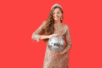 Poster - Young woman in tiara and shiny prom dress with disco ball on red background