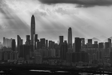  Silhouette of skyline of Shenzhen city, China under sunset. Viewed from Hong Kong border