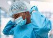 Surgeon, doctor and surgery with face mask and health, man in ppe for safety, operation and ready for procedure. Cardiovascular healthcare, clean scrubs and person in clinic with male physician