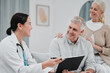 © Mumtaaz D/peopleimages.com - Nurse, medical and consulting with a senior couple in their home, talking to a medicine professional. Healthcare, insurance or life cover with a mature man and woman meeting a medicine professional