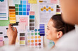 © Coral N/peopleimages.com - Designer, color palette and people planning creative project, brand development or b2b collaboration advice. Ideas brainstorming on moodboard of design worker, woman and client for choice or decision