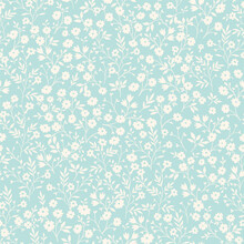 Vintage Seamless Tiny Floral Pattern. Turquoise Background With Small Light Yellow Flowers. Design For Wallpaper, Clothing, Packaging, Fabric, Cover, Textiles
