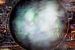 © Cavan Images - Atchafalaya River, Louisiana, USA. A steaming pot of poblano peppers cooked over a wood fire.