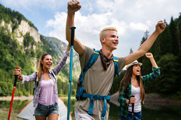 Wall Mural - hiking friends travel outdoor group sport lifestyle concept