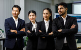 Fototapeta  - Millennial Asian professional successful female businesswomen Indian multinational male businessmen in formal business suit standing side by side crossed arms posing taking photo together in company