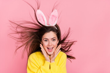 Wall Mural - Photo of young excited pretty girl reaction wear costume event pet rabbit isolated over pink color background