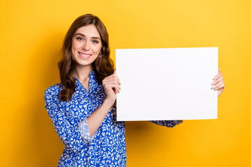 Canvas Print - Photo of gorgeous stunning lady wear trendy clothes demonstrate paper sheet empty space isolated on yellow color background