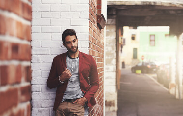 Poster - Looking good. Cropped shot of a stylish man standing in the city.