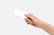 © Hulahop - Woman's  hand showing credit card, or card, or business card or voucher, isolated on white background, template, mock-up