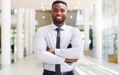 Poster - I am not afraid of any work challenges. Cropped portrait of a handsome young businessman standing with his arms folded ad holding a tablet while in the office.