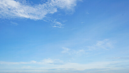 Wall Mural - blue sky and white cirrocumulus clouds texture background. blue sky on sunny day. beautiful blue sky