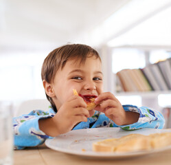 Sticker - I love jam on toast the most. A cute little boy eating breakfast.