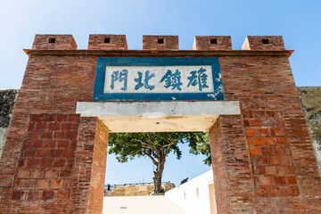 Wall Mural - Kaohsiung, Taiwan- February 13, 2023: Building view of The North Gate of Xiong Town ( Syongjhen North Gate) in Kaohsiung, Taiwan. It was built in 1875 by the Chinese Qing dynasty.