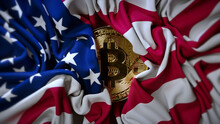 The American Flag Is Unfurled And Bitcoin Opens. Gold Coin. Cryptocurrency. Mining. Wrinkled Fabric.