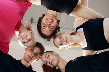 A group of girls and guys discussing while spending time together Energy, action and mindset of an athlete on a basketball court with motivation and commitment to urban outdoor sports