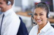 © AW/peopleimages.com - Thats a smile for sales. Shot of a young woman wearing a headset.
