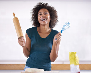 Poster - Which one is called the rolling pin. Young woman preparing dough in her kitchen.