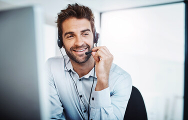 Aufkleber - Happy to help. Shot of a young call centre agent working in an office.