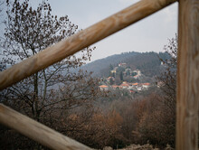 Landscape With Trees And Hill In Turin Through The Wooden Fence 