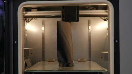 Wall Mural - Printing mechanism is adding layers to ae 3D object. Media. Printer working at 3d printing lab.