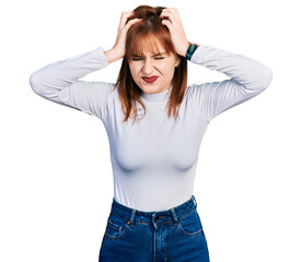 Poster - Redhead young woman wearing casual turtleneck sweater suffering from headache desperate and stressed because pain and migraine. hands on head.